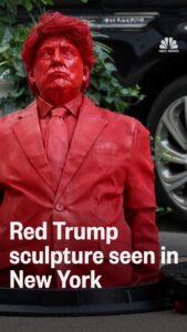 Watch the red sculpture of Trump emerge from a NYC manhole – USA Today
